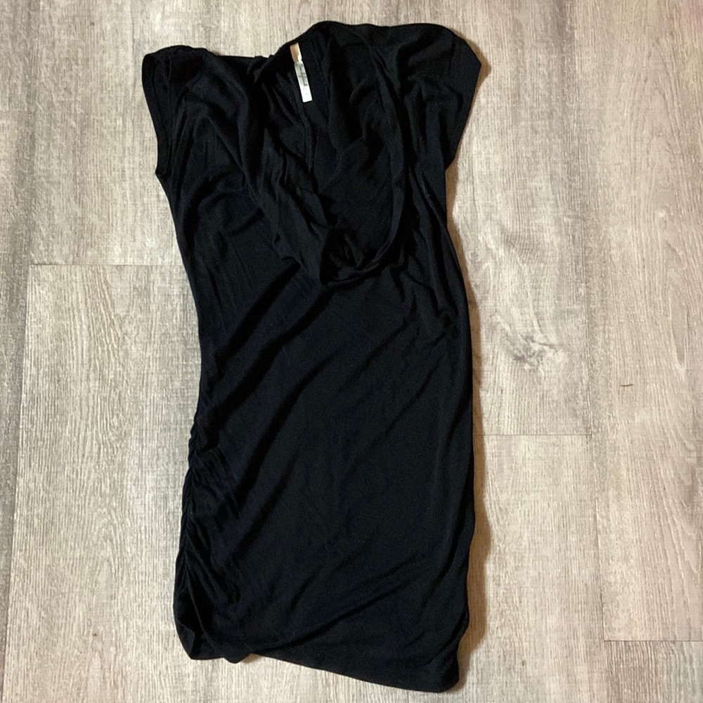 Ruched flattering shirt with scoop neck and sparkle trim on back